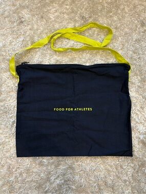 The Feed Food for Athletes Navy Blue Zip Tote with Neon Yellow Green Long Strap